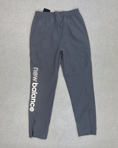 NEW BALANCE WOVEN PANT